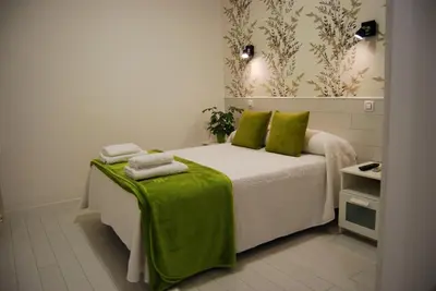 Cama o camas de una habitación en Hostal PETITE MAMAN