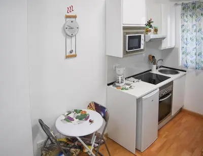 Una cocina o zona de cocina en LOFT PUERTA DE SOL