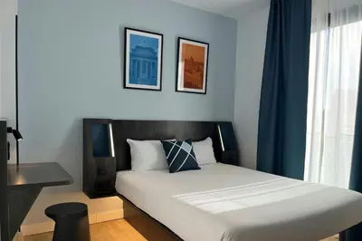 Cama o camas de una habitación en Four Points Flex by Sheraton Madrid Atocha
