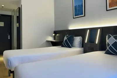 Cama o camas de una habitación en Four Points Flex by Sheraton Madrid Atocha