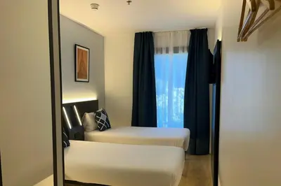 Cama o camas de una habitación en Four Points Flex by Sheraton Madrid Atocha