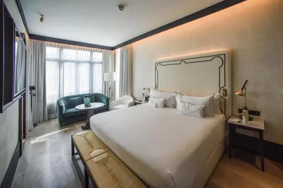 Cama o camas de una habitación en Hotel Montera Madrid, Curio Collection By Hilton