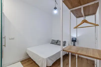 Cama o camas de una habitación en MyHouseSpain - Moderno apartamento ubicación inmejorable Madrid