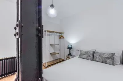 Cama o camas de una habitación en MyHouseSpain - Moderno apartamento ubicación inmejorable Madrid