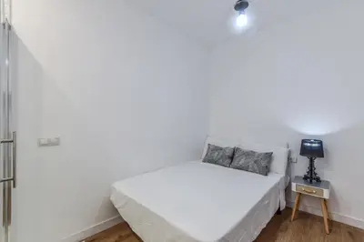 Cama o camas de una habitación en MyHouseSpain - Moderno apartamento ubicación inmejorable Madrid