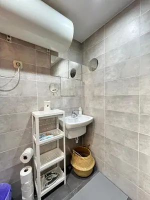 Un baño de Estudio Caravaca Temporal