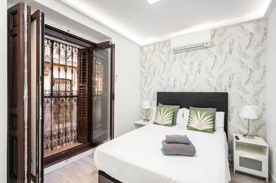 Cama o camas de una habitación en Noviciado Apartment