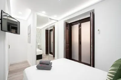 Cama o camas de una habitación en Noviciado Apartment