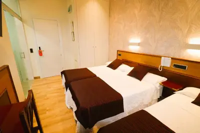 Cama o camas de una habitación en Hostal Hispano - Argentino Gran Vía