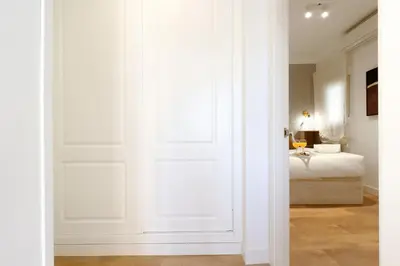 Cama o camas de una habitación en Apartamentos Madrid Río