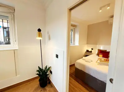 Cama o camas de una habitación en Apartamentos Madrid Río