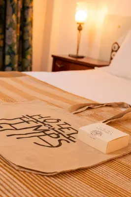 Cama o camas de una habitación en Hotel du Temps Madrid