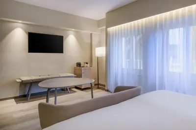 Cama o camas de una habitación en AC Hotel Carlton Madrid by Marriott