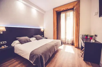 Cama o camas de una habitación en Hostal Marlasca