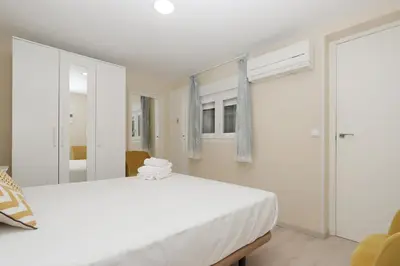 Cama o camas de una habitación en Fantástico Piso en La Latina, Madrid 6 personas
