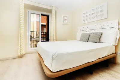 Cama o camas de una habitación en Fantástico Piso en La Latina, Madrid 6 personas