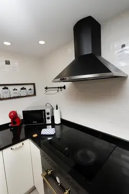 Una cocina o zona de cocina en Fantástico Piso en La Latina, Madrid 6 personas