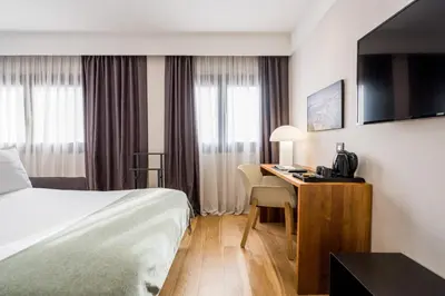 Cama o camas de una habitación en Zenit Abeba