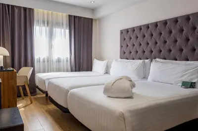 Cama o camas de una habitación en Zenit Abeba