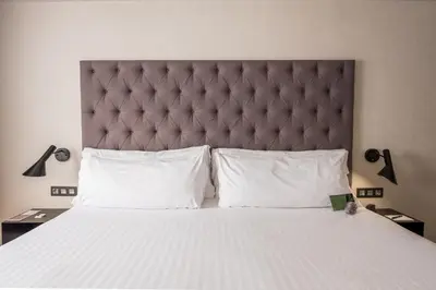 Cama o camas de una habitación en Zenit Abeba