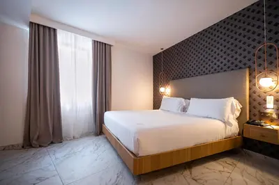 Cama o camas de una habitación en UMusic Hotel Madrid