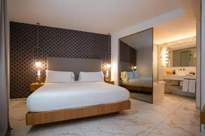 Cama o camas de una habitación en UMusic Hotel Madrid