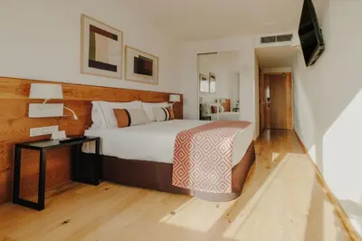 Cama o camas de una habitación en Rafaelhoteles Atocha