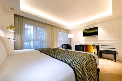 Cama o camas de una habitación en Eurostars Madrid Gran Vía