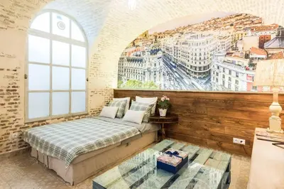 Cama o camas de una habitación en Chueca - Apartamento tranquilo para 4 personas-P35