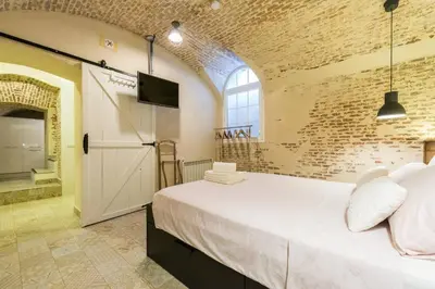 Cama o camas de una habitación en Chueca - Apartamento tranquilo para 4 personas-P35