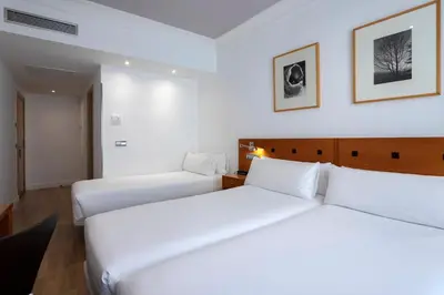 Cama o camas de una habitación en Petit Palace Cliper-Gran Vía