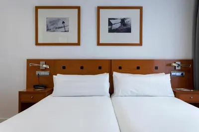Cama o camas de una habitación en Petit Palace Cliper-Gran Vía