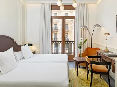 Cama o camas de una habitación en Boutique Hotel H10 Villa de la Reina