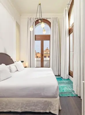 Cama o camas de una habitación en Boutique Hotel H10 Villa de la Reina