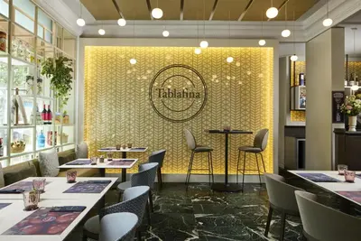 Un restaurante o sitio para comer en NH Madrid Nacional