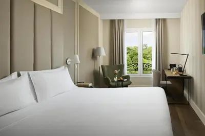 Cama o camas de una habitación en NH Madrid Nacional