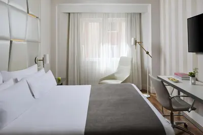 Cama o camas de una habitación en NH Collection Madrid Colón