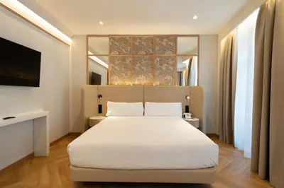Cama o camas de una habitación en Petit Palace Chueca