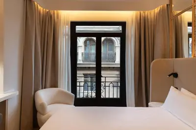 Cama o camas de una habitación en Petit Palace Chueca
