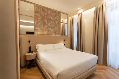 Cama o camas de una habitación en Petit Palace Chueca