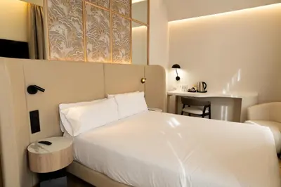 Cama o camas de una habitación en Petit Palace Chueca