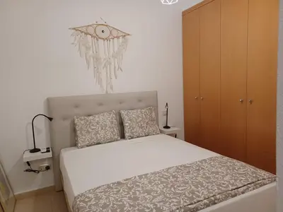 Cama o camas de una habitación en For You Rentals TEMPORAL Infantas Gran Via DIN132E