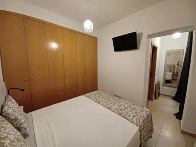 Cama o camas de una habitación en For You Rentals TEMPORAL Infantas Gran Via DIN132E