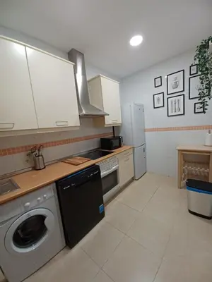Una cocina o zona de cocina en For You Rentals TEMPORAL Infantas Gran Via DIN132E