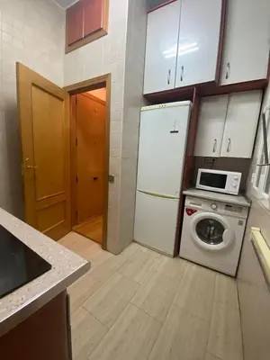 Una cocina o zona de cocina en Homy Gran Via