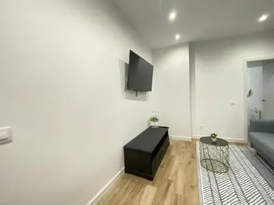 Una televisión o centro de entretenimiento en Piso Lacy Ile Temporal