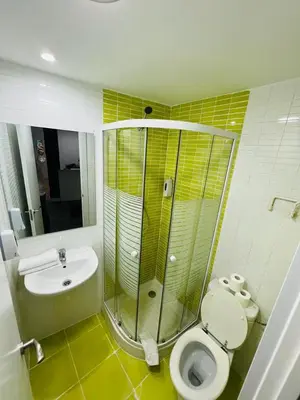 Un baño de ESTUDIOS RUDA 4
