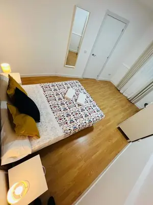 Cama o camas de una habitación en ESTUDIOS RUDA 4