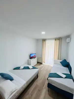 Cama o camas de una habitación en ESTUDIOS RUDA 4