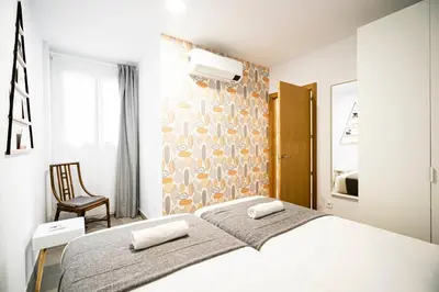 Cama o camas de una habitación en Dobo Madrid ANR2